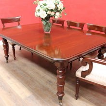Load image into Gallery viewer, Antique English Mahogany Dining Table with Turned Legs, Brass Cups & Castors. B12646
