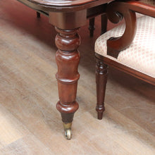 Load image into Gallery viewer, Antique English Mahogany Dining Table with Turned Legs, Brass Cups & Castors. B12646