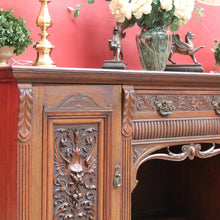 Load image into Gallery viewer, English Oak Sideboard with Carved Greenman Detail and Art Nouveau Handles. B12660