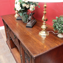 Load image into Gallery viewer, English Oak Sideboard with Carved Greenman Detail and Art Nouveau Handles. B12660