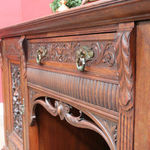 Load image into Gallery viewer, English Oak Sideboard with Carved Greenman Detail and Art Nouveau Handles. B12660