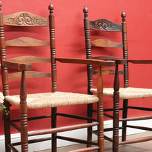 Load image into Gallery viewer, Pair of Antique French Carver Chairs with Rush Seats and Carved Ladder Backs. B12693