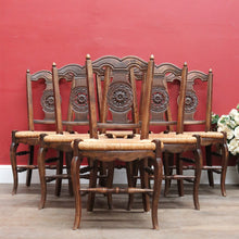 Load image into Gallery viewer, Set of Six Antique French Dining Chairs with Carved Details and Curved Backs and Floral Centrepiece. B12642