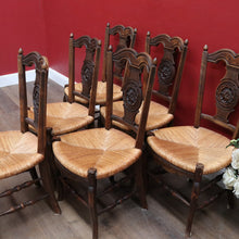 Load image into Gallery viewer, Set of Six Antique French Dining Chairs with Carved Details and Curved Backs and Floral Centrepiece. B12642