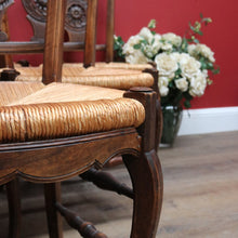 Load image into Gallery viewer, Set of Six Antique French Dining Chairs with Carved Details and Curved Backs and Floral Centrepiece. B12642