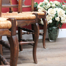 Load image into Gallery viewer, Set of Six Antique French Dining Chairs with Carved Details and Curved Backs and Floral Centrepiece. B12642