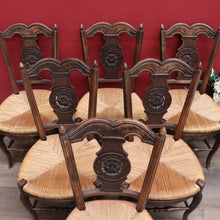 Load image into Gallery viewer, Set of Six Antique French Dining Chairs with Carved Details and Curved Backs and Floral Centrepiece. B12642