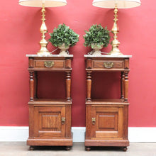 Load image into Gallery viewer, Pair of French Oak Bedside Cabinets with Marble Tops Turned Supports Brass Handles and Cupboard Storage. B12740
