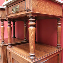 Load image into Gallery viewer, Pair of French Oak Bedside Cabinets with Marble Tops Turned Supports Brass Handles and Cupboard Storage. B12740