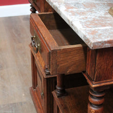 Load image into Gallery viewer, Pair of French Oak Bedside Cabinets with Marble Tops Turned Supports Brass Handles and Cupboard Storage. B12740