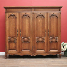 Load image into Gallery viewer, X SOLD Antique French Oak Four Door Armoire Wardrobe with Hanging Space and Shelves. B12320