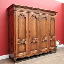 Load image into Gallery viewer, X SOLD Antique French Oak Four Door Armoire Wardrobe with Hanging Space and Shelves. B12320