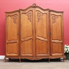Load image into Gallery viewer, Antique French Oak 4 Door Breakfront Wardrobe Armoire with Hanging Rail and Shelves. B12804