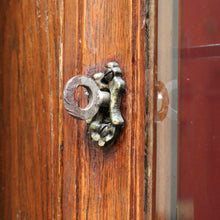 Load image into Gallery viewer, French antique oak display cabinet with carved detail and glass shelves. B12935