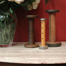 Load image into Gallery viewer, Three Antique Industrial Bobbins, Spools, Cotton or silk roving bobbins, now used as hat holder, Christmas scrolls, decorative pieces. B11502