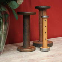 Load image into Gallery viewer, Three Antique Industrial Bobbins, Spools, Cotton or silk roving bobbins, now used as hat holder, Christmas scrolls, decorative pieces. B11502