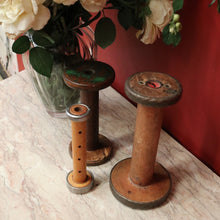 Load image into Gallery viewer, Three Antique Industrial Bobbins, Spools, Cotton or silk roving bobbins, now used as hat holder, Christmas scrolls, decorative pieces. B11502