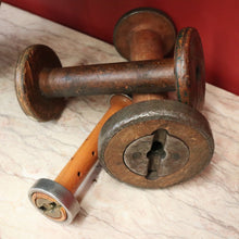 Load image into Gallery viewer, Three Antique Industrial Bobbins, Spools, Cotton or silk roving bobbins, now used as hat holder, Christmas scrolls, decorative pieces. B11502