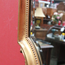 Load image into Gallery viewer, Antique Gilt Dutch Bevelled Edge Wall Hanging Mirror Shield shape with Floral details B12043