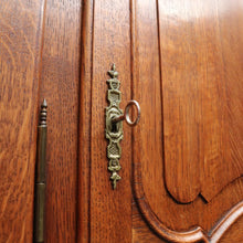 Load image into Gallery viewer, Antique French oak armoire or wardrobe with three doors and three keys. B12726