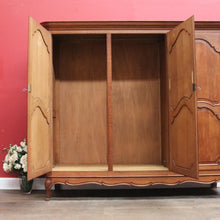 Load image into Gallery viewer, Antique French oak armoire or wardrobe with three doors and three keys. B12726
