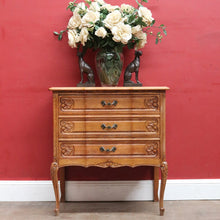 Load image into Gallery viewer, Vintage French chest of three drawers with carved detail and cast metal handles. B12824