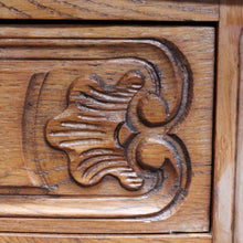 Load image into Gallery viewer, Vintage French chest of three drawers with carved detail and cast metal handles. B12824