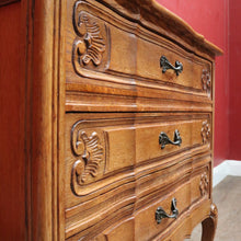 Load image into Gallery viewer, Vintage French chest of three drawers with carved detail and cast metal handles. B12824
