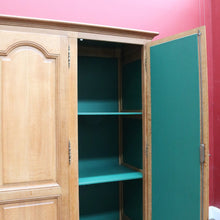 Load image into Gallery viewer, Antique French Oak 4 Door Armoire/ Wardrobe with hanging space shelves and three keys. B12743