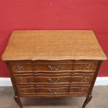 Load image into Gallery viewer, Vintage French chest of drawers with shaped front and brass handles. B12823