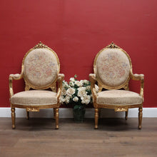 Load image into Gallery viewer, Pair of French Gilt Wood Armchairs with Medallion Backs and Tapestry Seats. B12623