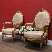 Load image into Gallery viewer, Pair of French Gilt Wood Armchairs with Medallion Backs and Tapestry Seats. B12623