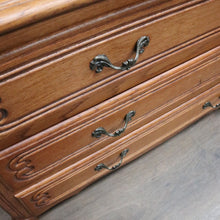 Load image into Gallery viewer, Vintage French oak chest of drawers with carved detail and cabriole legs. B12769