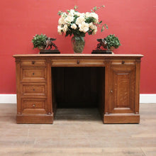 Load image into Gallery viewer, x SOLD Antique English oak and tan leather office desk with drawers and cupboard. B12635