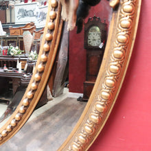 Load image into Gallery viewer, Vintage French Giltwood Oval Cushion Mirror with Silver Toned Cherubs and Rococo Gold Leaf Detail. B13047