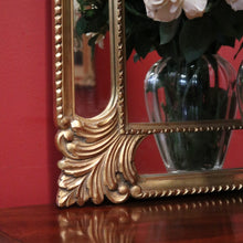 Load image into Gallery viewer, French Wall Hanging Mirror with a Heavily Ornate Gilt Frame. B12000