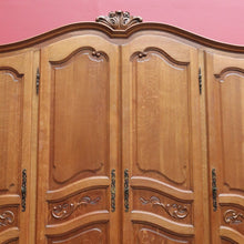 Load image into Gallery viewer, Antique French Oak Four Door Armoire Wardrobe Circa 1910 with Three Keys. B12821