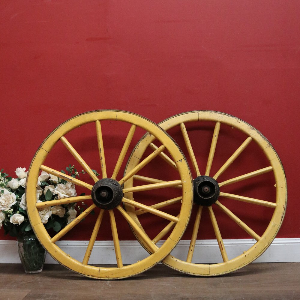 A Pair of Antique French Wagon or Cart Wheels, Steel and Timber and a Weathered Charm. B11899