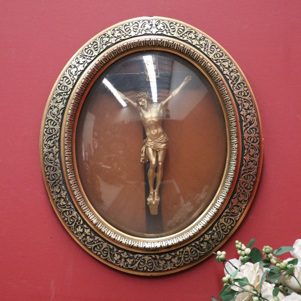 A 19th Century French Oval Gilt Framed Crucifix Corpus with Original Convex Glass. B11351