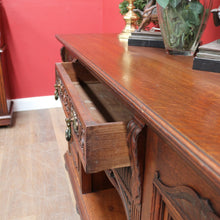 Load image into Gallery viewer, English Oak Sideboard with Carved Greenman Detail and Art Nouveau Handles. B12660
