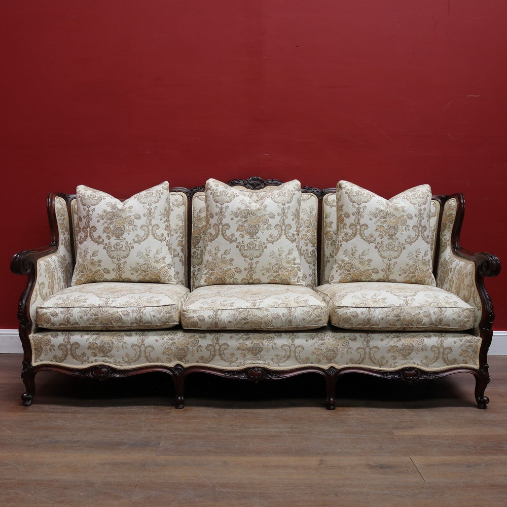 Grand Antique Victorian-Style Walnut Sofa with Cream Floral Upholstery and Cushions. B12695