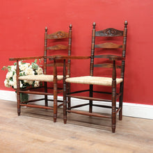 Load image into Gallery viewer, Pair of Antique French Carver Chairs with Rush Seats and Carved Ladder Backs. B12693
