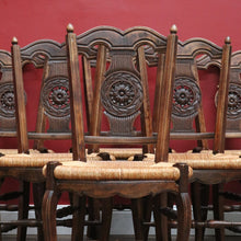 Load image into Gallery viewer, Set of Six Antique French Dining Chairs with Carved Details and Curved Backs and Floral Centrepiece. B12642
