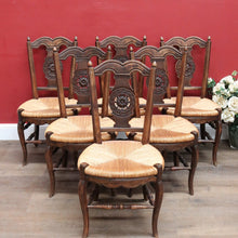 Load image into Gallery viewer, Set of Six Antique French Dining Chairs with Carved Details and Curved Backs and Floral Centrepiece. B12642
