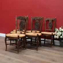 Load image into Gallery viewer, Set of Six Antique French Dining Chairs with Carved Details and Curved Backs and Floral Centrepiece. B12642
