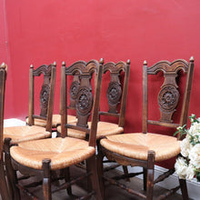 Load image into Gallery viewer, Set of Six Antique French Dining Chairs with Carved Details and Curved Backs and Floral Centrepiece. B12642
