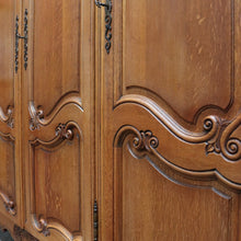 Load image into Gallery viewer, x SOLD Antique French Oak Wardrobe or Armoire with Four Doors Hanging Storage Shelves Carved Detail and Keys. B12804
