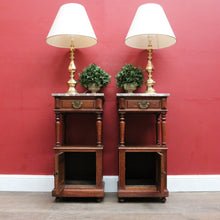 Load image into Gallery viewer, Pair of French Oak Bedside Cabinets with Marble Tops Turned Supports Brass Handles and Cupboard Storage. B12740
