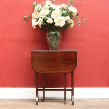 Load image into Gallery viewer, English Mahogany Antique Sutherland Drop Leaf Table with Porcelain Castors. B12890
