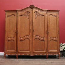 Load image into Gallery viewer, Antique French Four-Door Armoire with Hanging and Shelving – Three Keys Included. B12264
